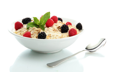 tasty oatmeal with berries, isolated on white