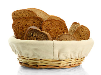 tasty sliced rye bread in basket, isolated on white