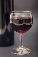 Glass and bottle of wine