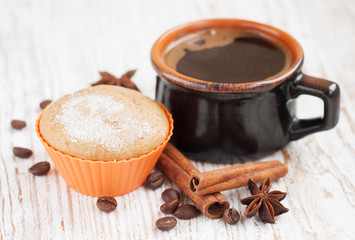 Chocolate  muffin with cup of coffee