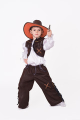 Little boy posing in cowboy fancy dress