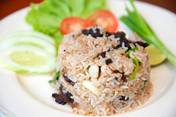 delicious hot fried rice with jerked meat and vegetable