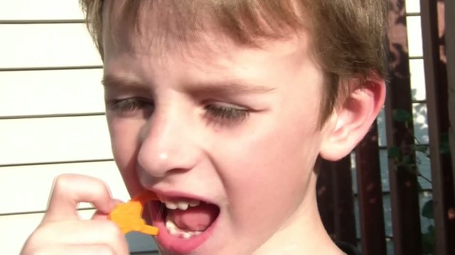 Boy Flossing Teeth