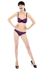 Naklejka premium Stunning lady posing in lingerie, laughing heartily
