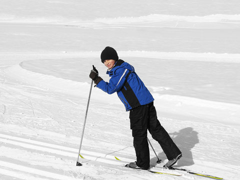 Boy doing cross country skiing