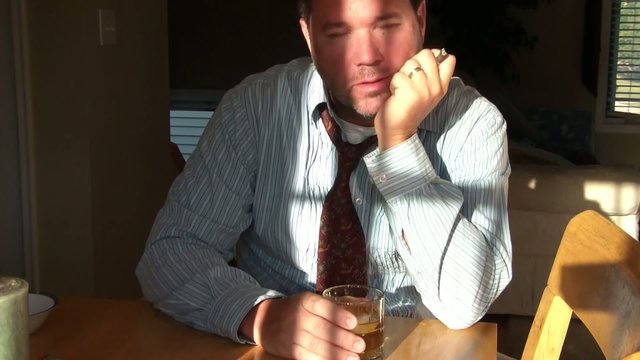 Businessman Drinking Alcohol & Smoking