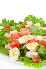 fresh salmon salad, lettuce and quail eggs