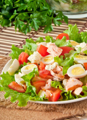 fresh salmon salad, lettuce and quail eggs