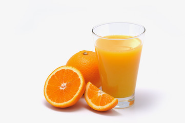 Orange juice in glass and orange
