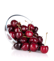 Ripe cherries in a glass bowl