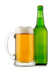 Mug and bottle of beer isolated on white