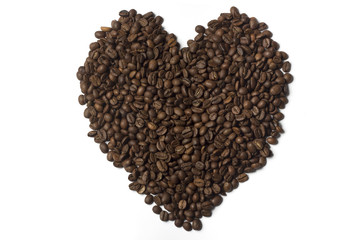 Coffee beans lined in the shape of heart