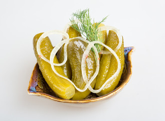 Closeup view of pickled cucmbers in a bowl