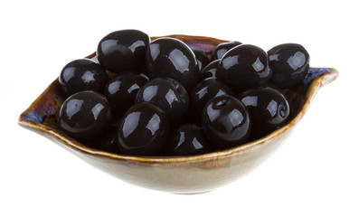 Olives black watered with olive oil in a bowl isolated on a whit
