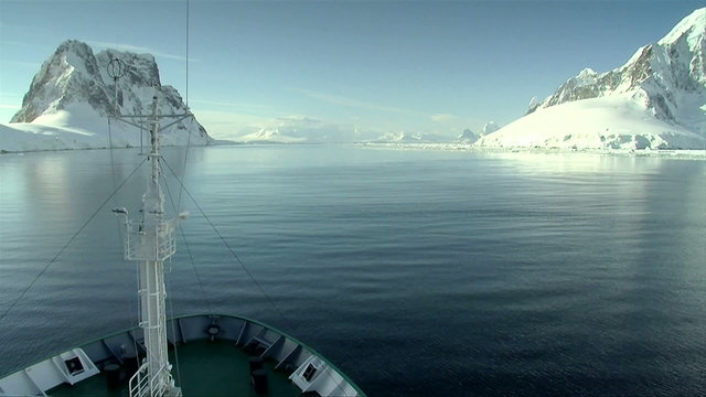 ship cruises through antarctica