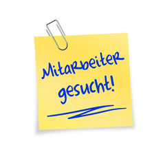Gelber Notizzettel mit Büroklammer - Mitarbeiter gesucht!