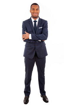 Full length of a young African American business man standing on