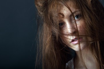 young beautiful woman with wild hair