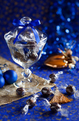 Christmas chocolate truffles in glass jar. Selective focus