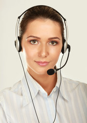 Beautiful business woman with headset. Call center