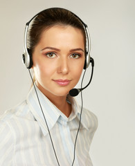 Beautiful business woman with headset