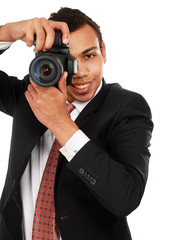 A smiling professional photographer