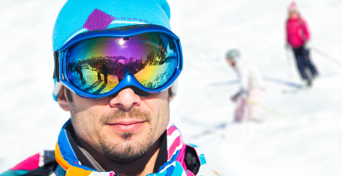Young man with ski goggles