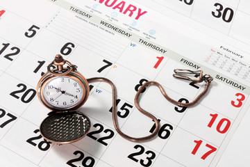 Pocket Watch on Calendar