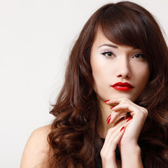 young beautiful woman with pefect long hair and vivid red lipsti