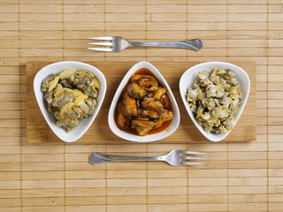 Three bowls of seafood