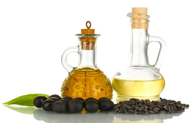 Olive and sunflower oil in the small decanters isolated on