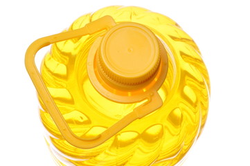 Edible oil in a plastic bottle with a yellow lock