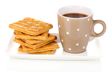 Cup of tea and cookies isolated on white