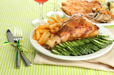 Roast chicken cutlet with boiled potatoes and cucumbers, glass