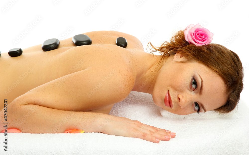 Sticker beautiful young woman in spa salon with spa stones, isolated