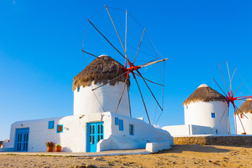 Windmills closeup with deep blue sky in Mykonos island cyclades - obrazy, fototapety, plakaty
