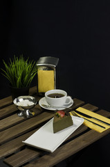Coffee, cake, table set fork knife and flower