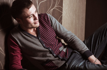 Fototapeta premium Full length portrait of happy handsome young man