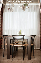 Modern cafe interior with wooden classical furniture