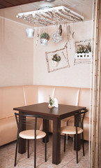 Modern cafe interior with wooden classical furniture