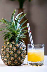 fresh cold pineapple juice extracted in pineapple fruit