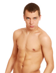 Fototapeta premium Strong man with a helathy body isolated over white