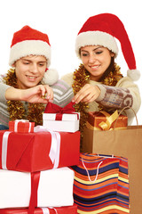 Portrait of young pretty couple holding big red box