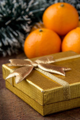 Orange mandarin with gift