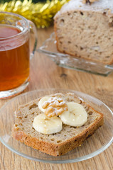 Slice of Christmas cake with banana walnut decorated slices of b