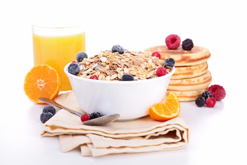 breakfast with muesli,berries and parncakes