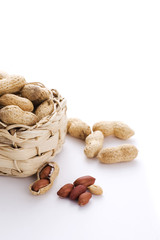 raw peanuts in basket