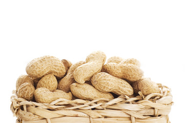 raw peanuts in basket