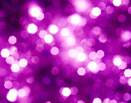 Abstract glowing lights violet background
