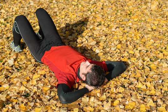 Athlete resting outdoors in autumn - Powered by Adobe